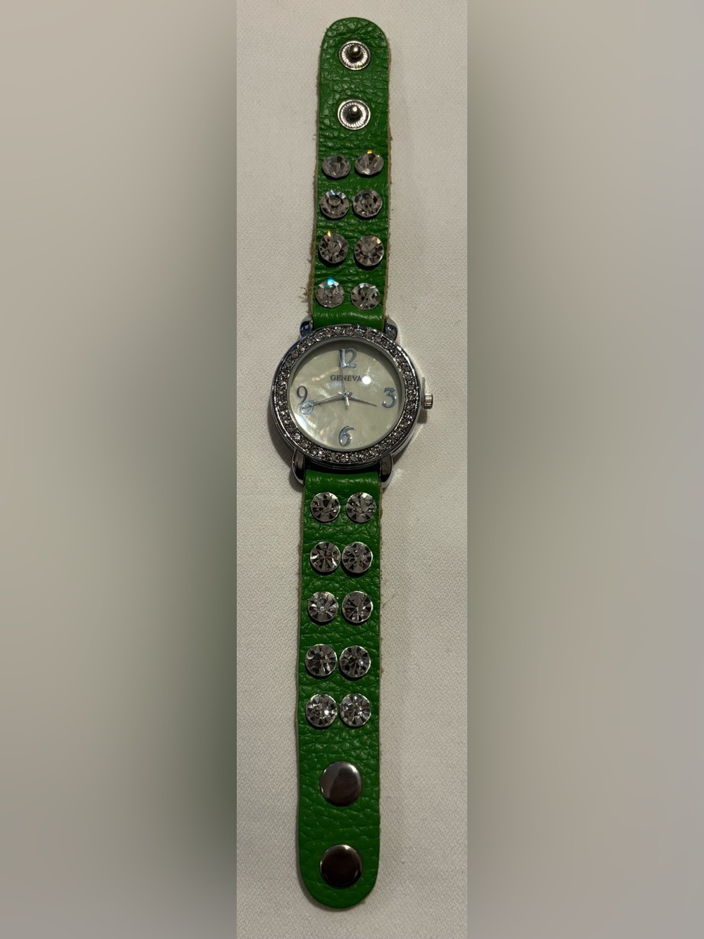 Geneva Women’s Analog Quartz Studded Crystal Green Strap Watch